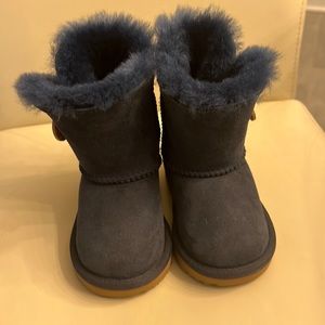 Navy blue toddler ugg boots with button on side